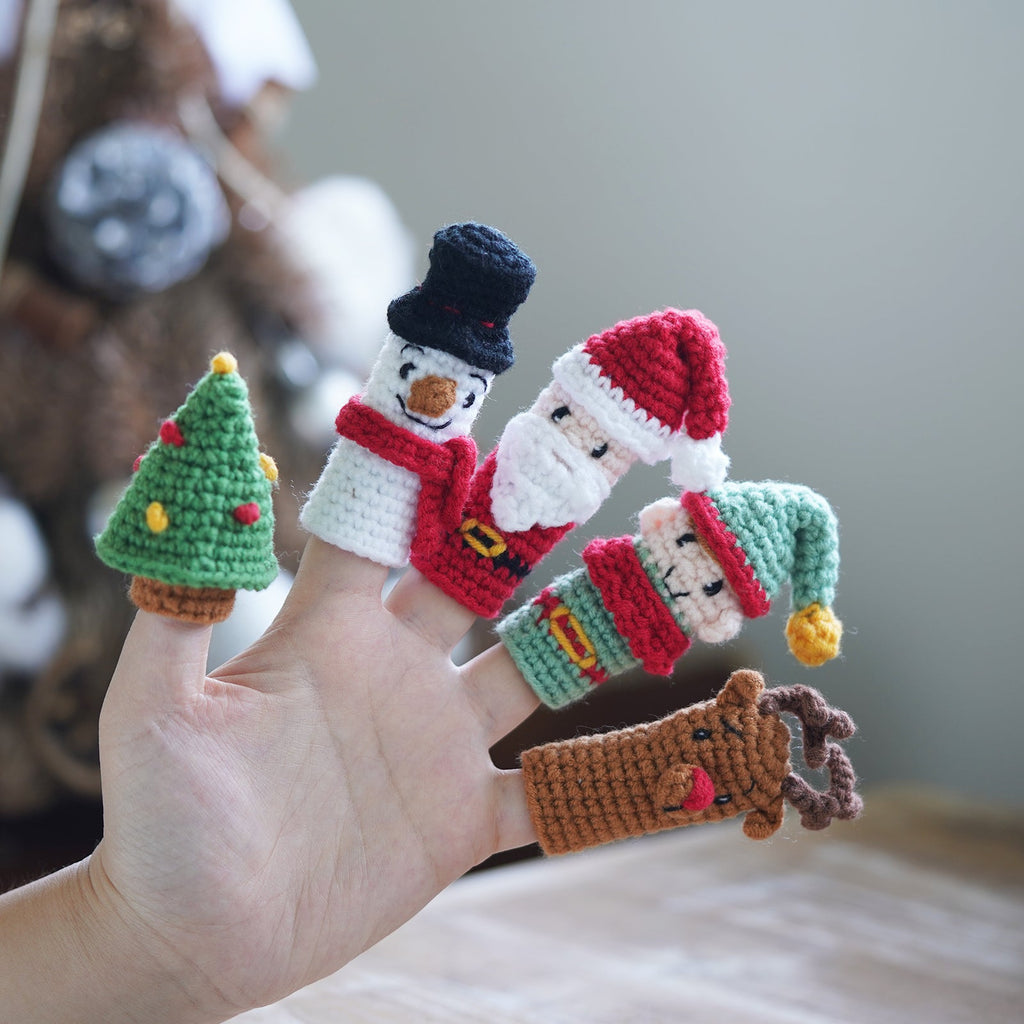 Christmas amigurumi crochet kit with yarn hook needle and finished miniature Santa and snowman figures — view 3