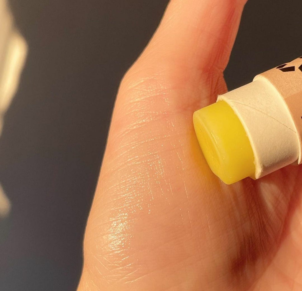 Organic pink grapefruit lip balm in eco-friendly push-up paper tube packaging — view 3