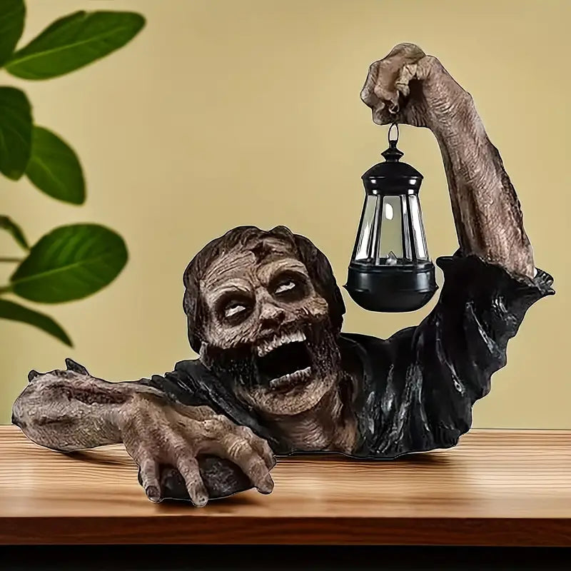 Realistic crawling zombie garden statue holding an LED lantern, made of hand-painted resin. — view 3
