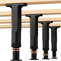 Four black adjustable plastic bed frame support legs for stabilizing king and queen mattresses
