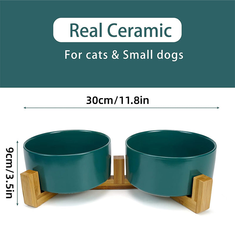 Double ceramic pet feeding bowls on an elevated wooden bamboo stand in stylish modern colors — view 3