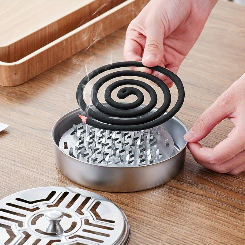 Silvery stainless steel portable mosquito coil burner holder with a decorative compact circular design — view 3