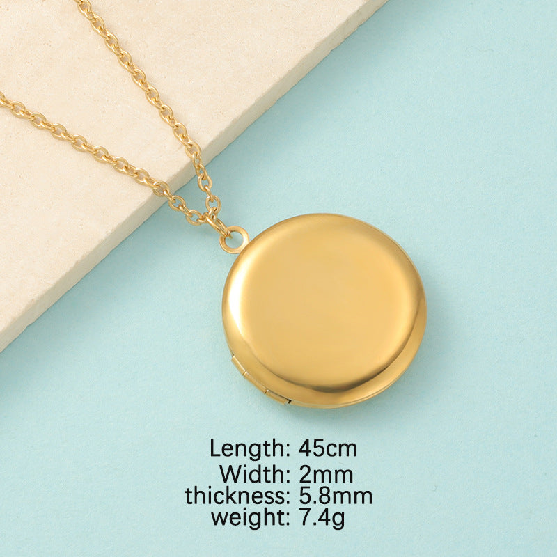 Heart shaped stainless steel mirror necklace with DIY photo frame locket on a neutral background — view 3