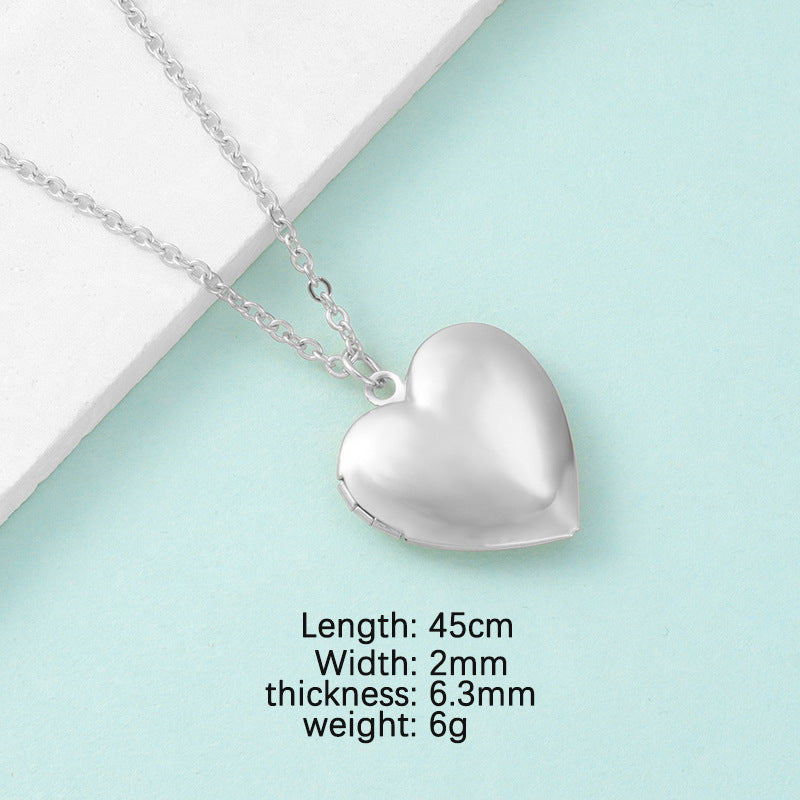 Heart shaped stainless steel mirror necklace with DIY photo frame locket on a neutral background — view 2