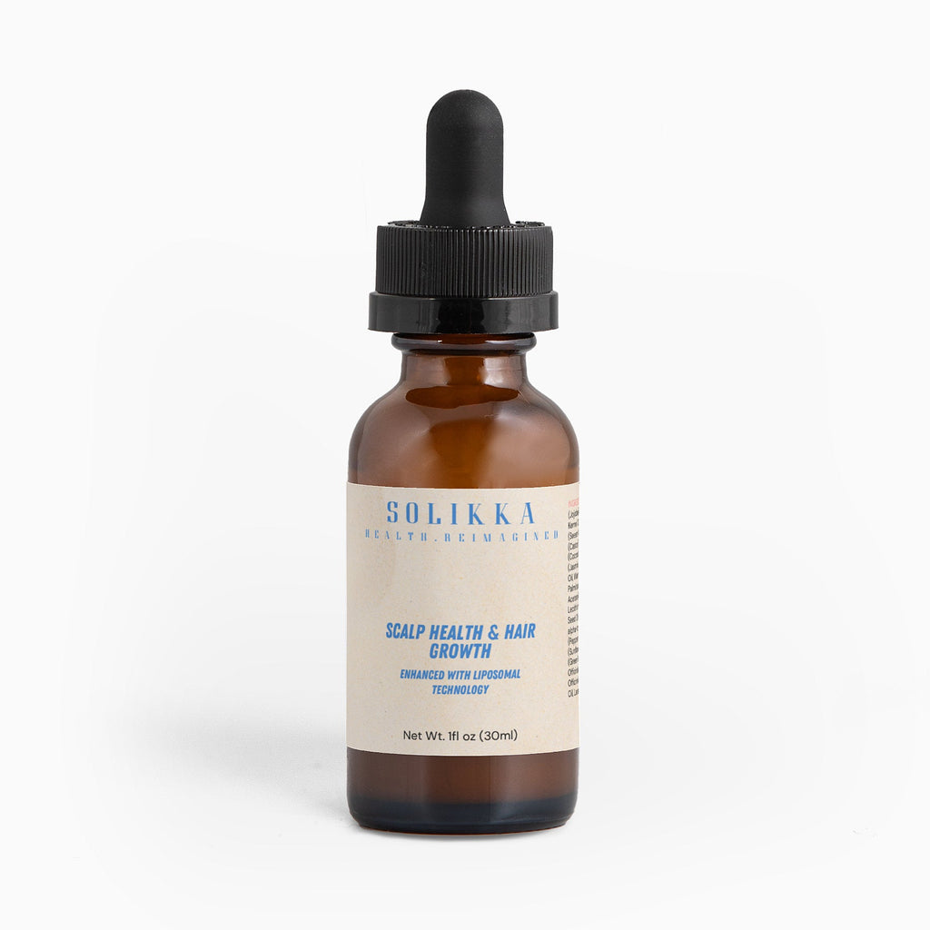 Hair oil for scalp health in one ounce dropper bottle with botanical ingredients