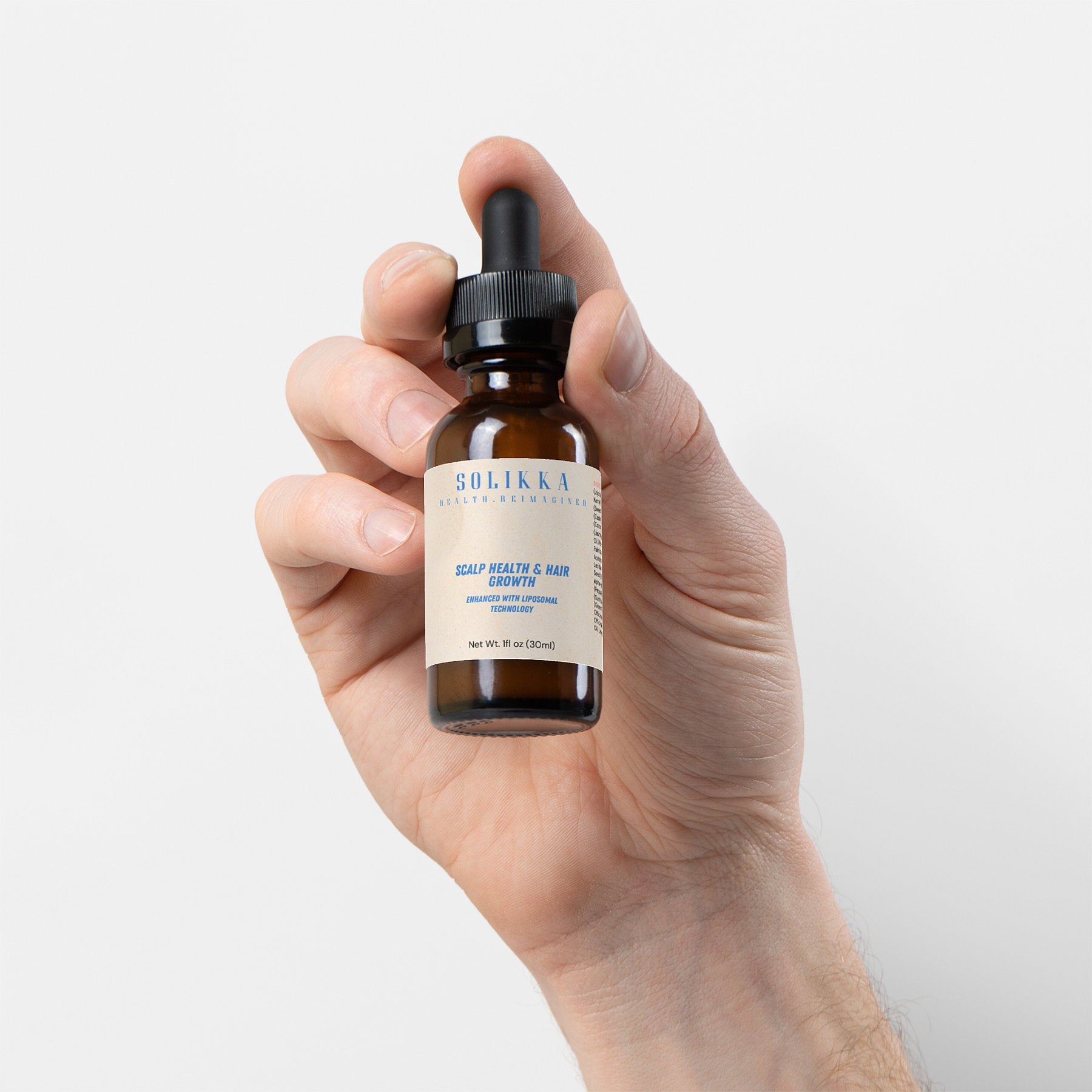 Hair oil for scalp health in one ounce dropper bottle with botanical ingredients — view 2