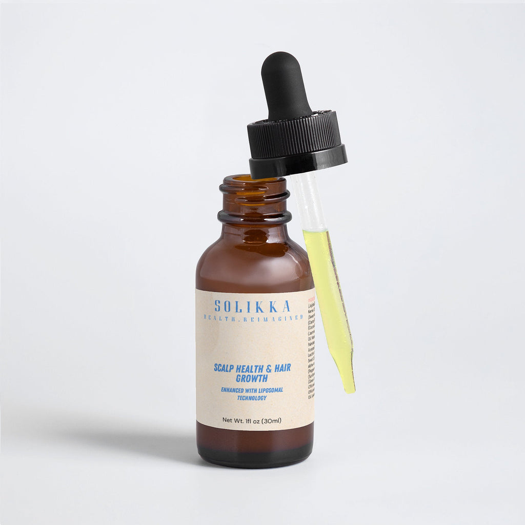 Hair oil for scalp health in one ounce dropper bottle with botanical ingredients — view 5