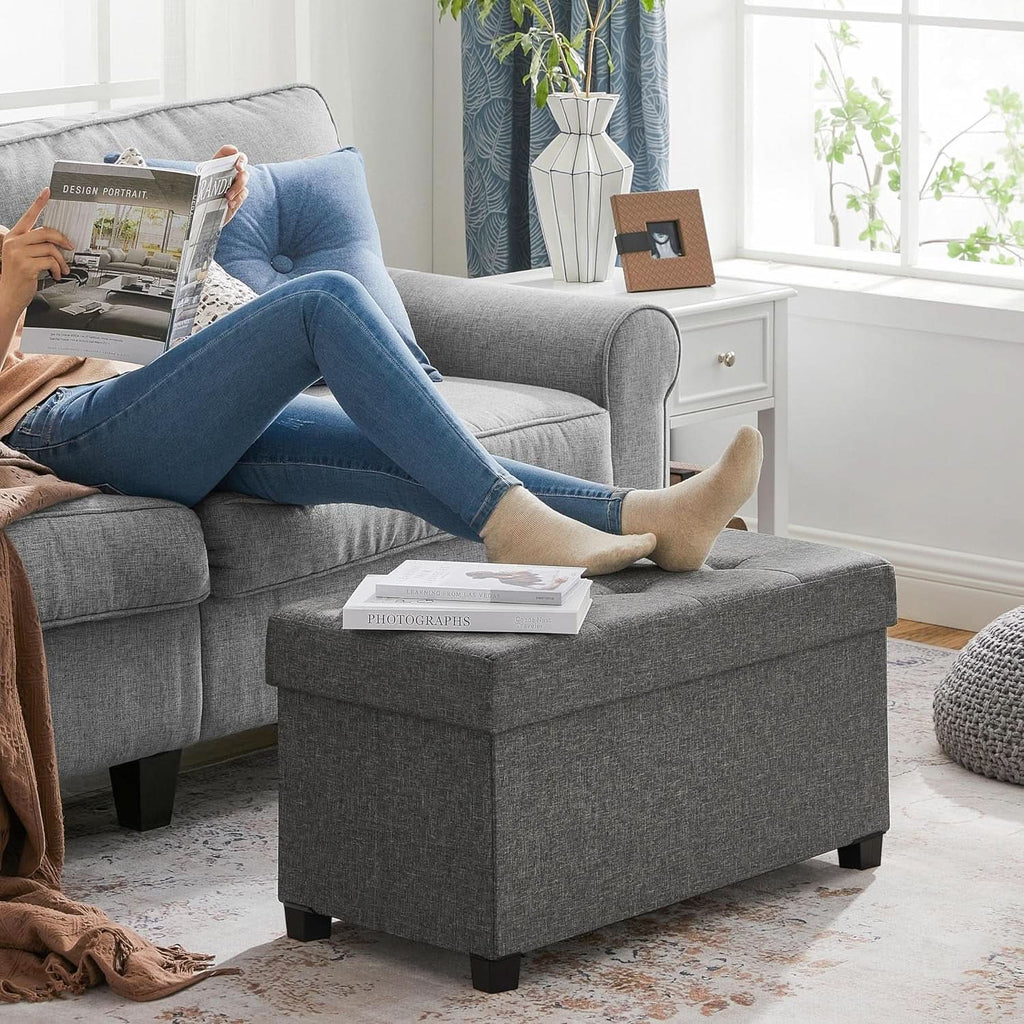 Slate gray storage ottoman bench in linen-look fabric with open lid showing hidden storage — view 4
