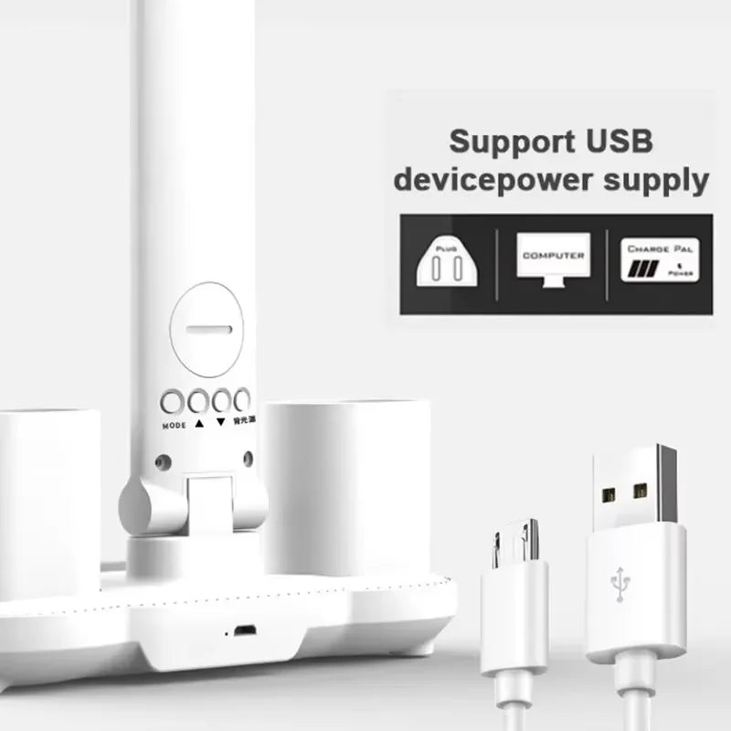 White rechargeable LED desk lamp featuring dual adjustable lighting heads and a foldable body. — view 2