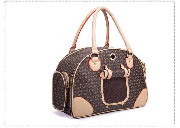 Luxury leather pet travel tote, stylish faux leather dog and cat carrier bag with sturdy handles.