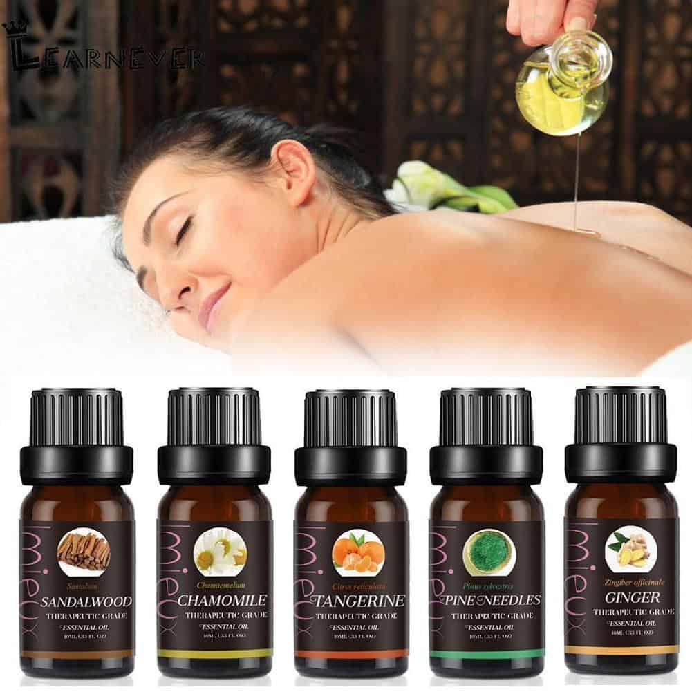 Small 10ml glass bottle of pure aromatherapy essential oil for spa massage and stress relief