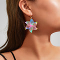 Colorful hollow flower metal dangle earrings in a vibrant Y2K retro style for women