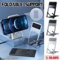 Adjustable folding black mobile phone and tablet stand holder resting on a flat surface
