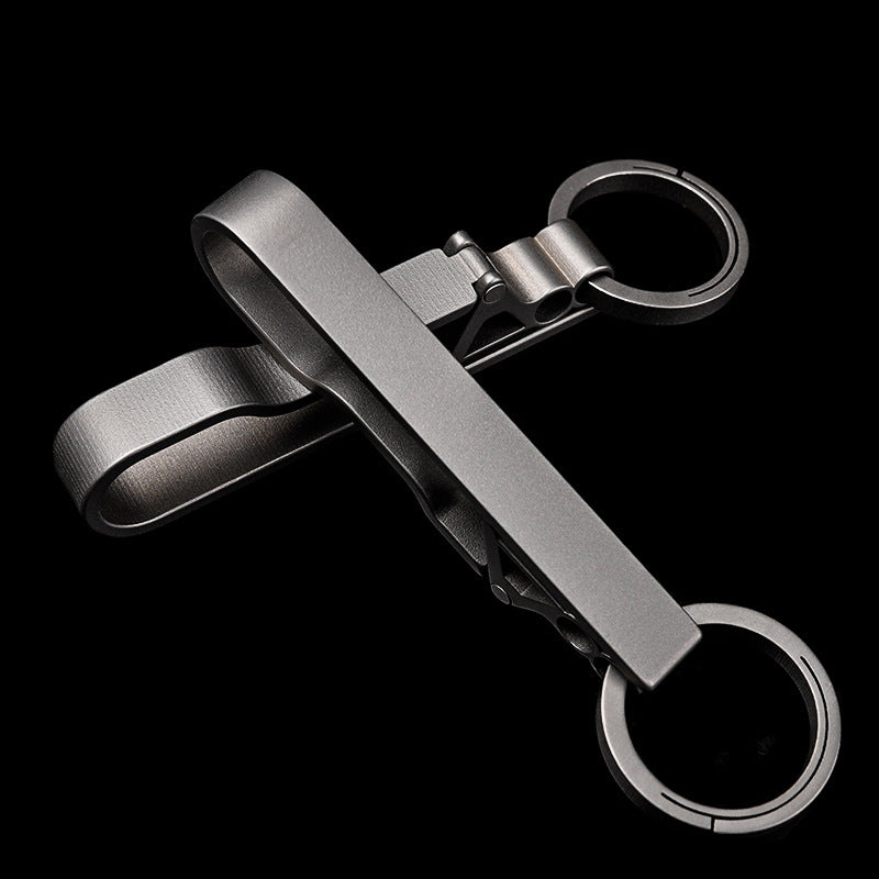Mens titanium alloy keychain with secure carabiner clip and minimalist silver metal finish