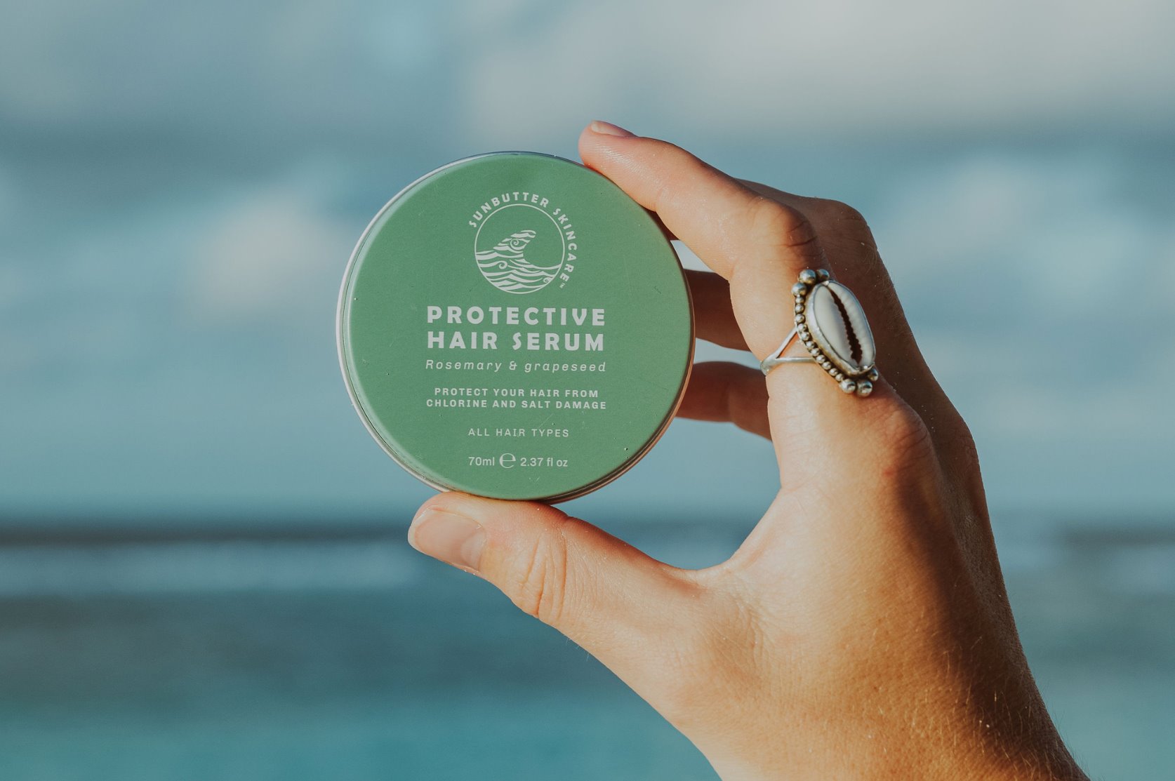 Protective rosemary hair serum in a glass dropper bottle, enriched with hydrating grapeseed oil. — view 2