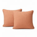 Rustic orange stonewashed cotton cushion cover with Mediterranean geometric floral medallion design.