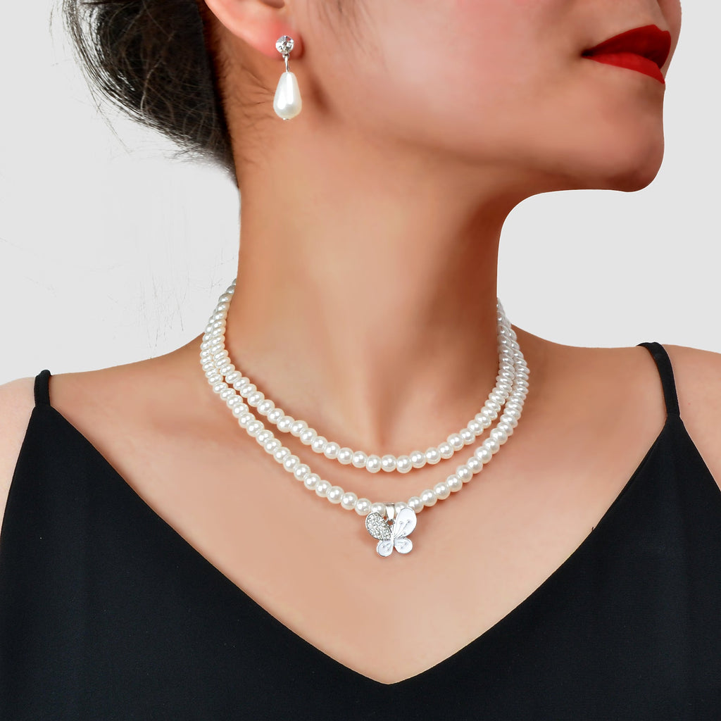 Imitation pearl jewelry set featuring a double layered necklace and matching water drop earrings
