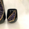 Set of two black ceramic vases featuring electroplated details and natural agate crystal stone accents