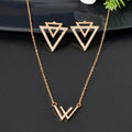 Double V pendant necklace and matching triangle earrings set featuring polished metallic geometric design.