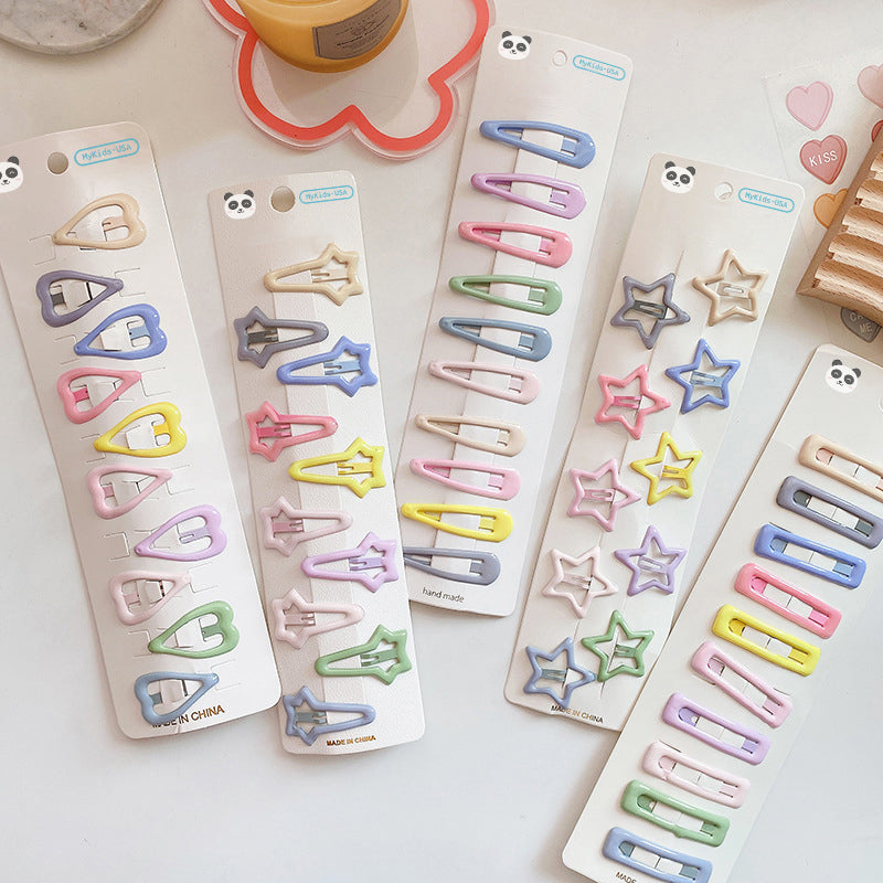 Colorful metal baby hair clip set in a magical pastel color palette.