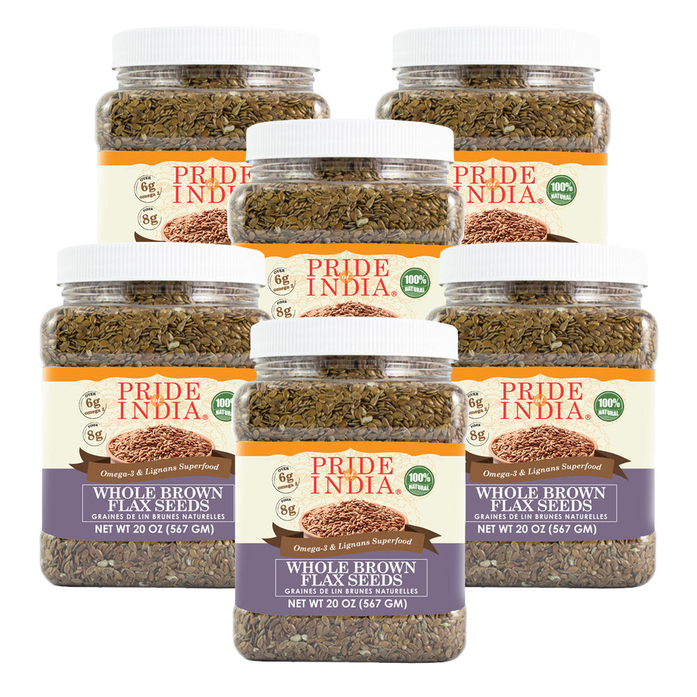 Whole brown flax seeds in a clear premium food storage jar with label — view 4