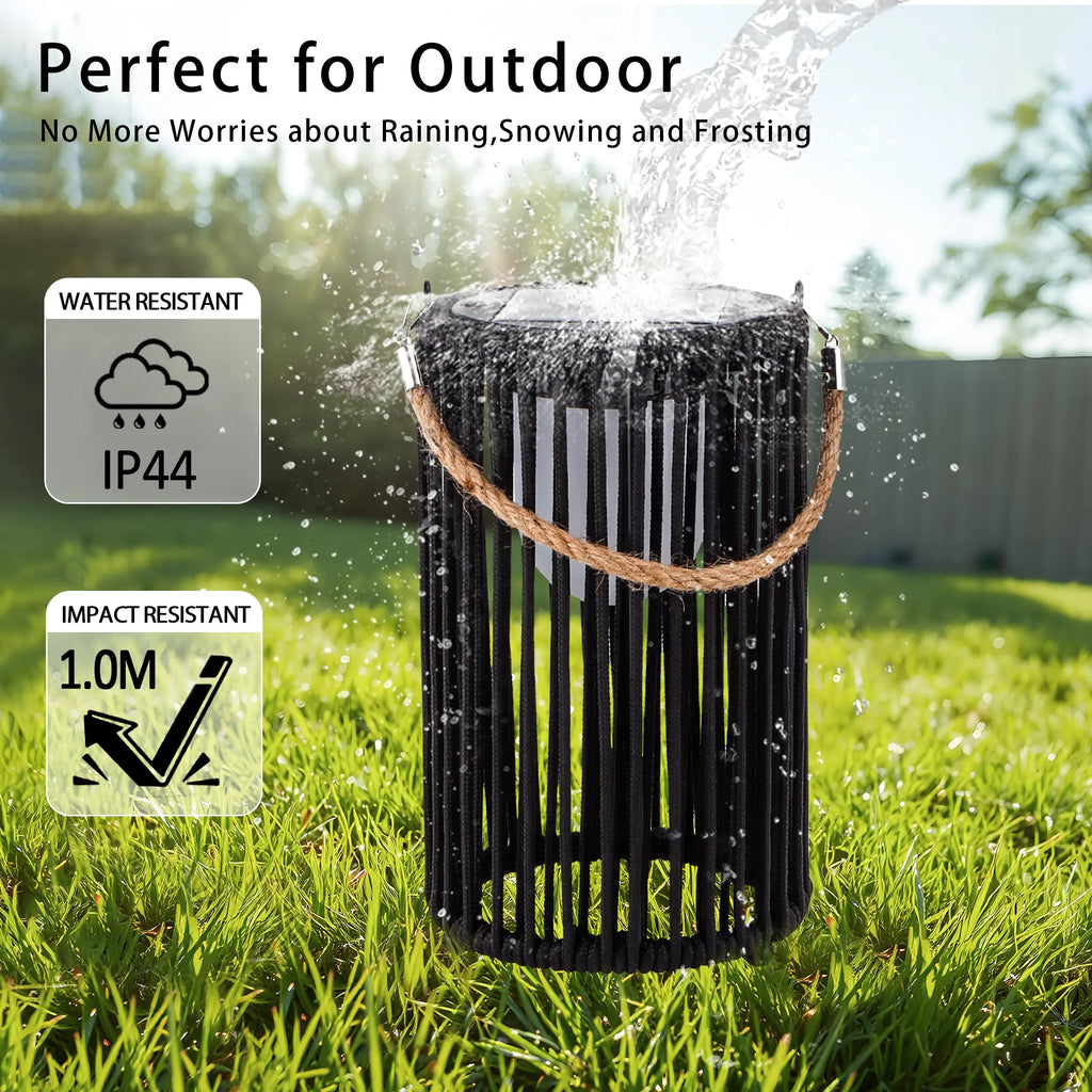 Two black metal 10.5 inch outdoor solar lanterns with rustic jute rope handles for garden lighting — view 3