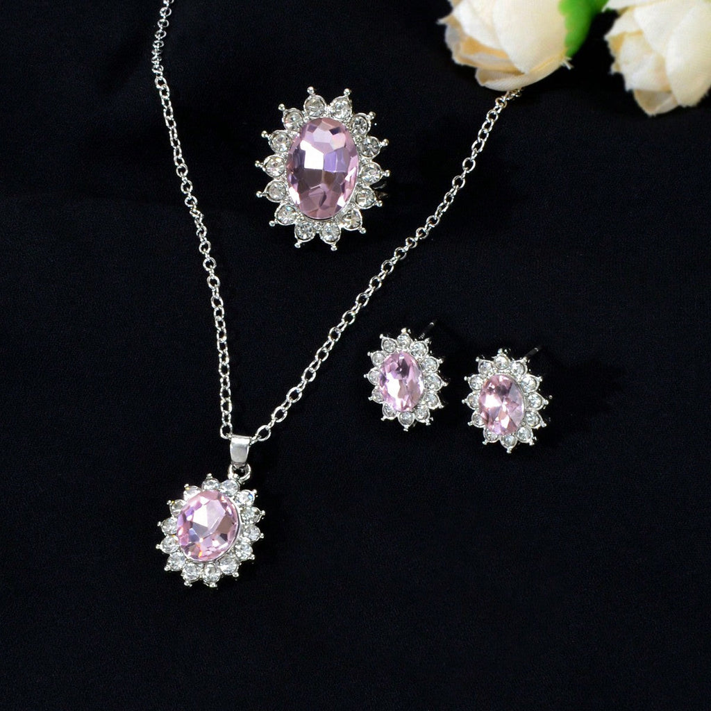 Luxury three piece crystal floral wedding jewelry set with necklace, stud earrings, and matching finger ring — view 5