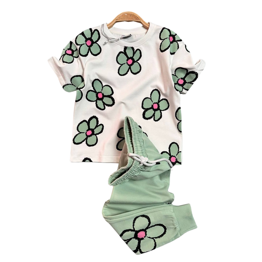Girls green cotton jogger set featuring a printed top and matching comfortable sweatpants