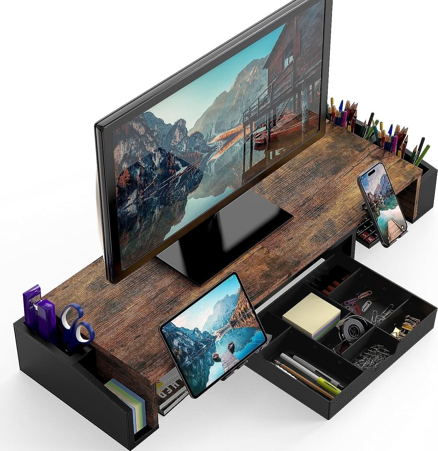 Rustic brown dual monitor stand riser with sliding storage drawer and smartphone holder on desk — view 2