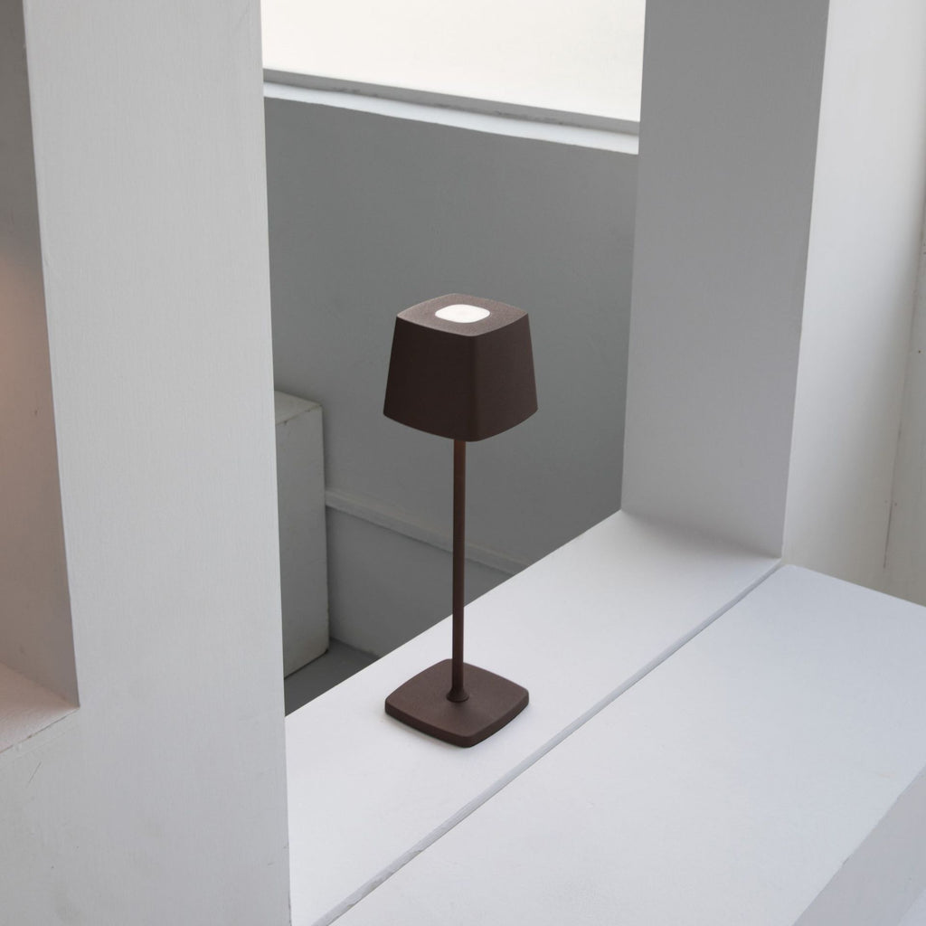 Minimalist aluminum alloy rechargeable LED desk lamp featuring a sleek cordless design for modern living spaces — view 2