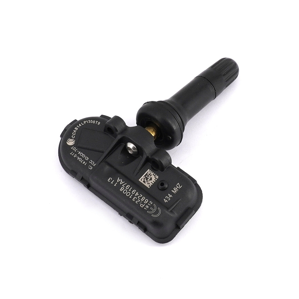 Four black automotive tyre pressure monitoring sensors arranged on a clean white background — view 5