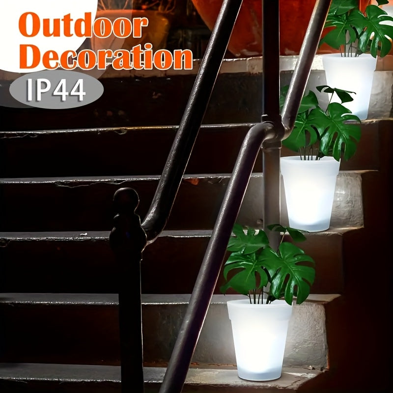 White flush mount outdoor solar LED garden pot light spotlight with polished plastic finish. — view 5