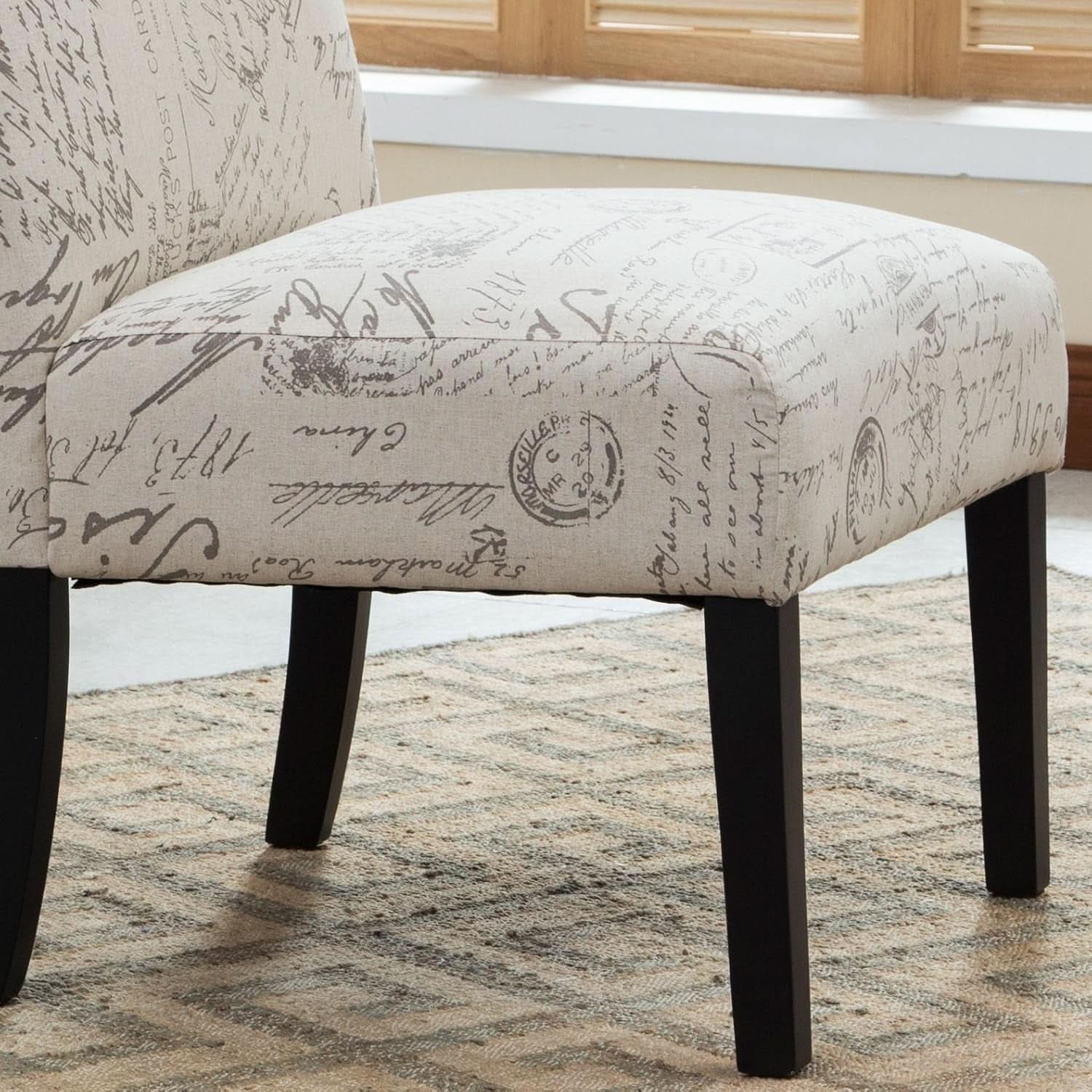 Armless upholstered accent chair with script print pattern and dark espresso wood legs — view 5