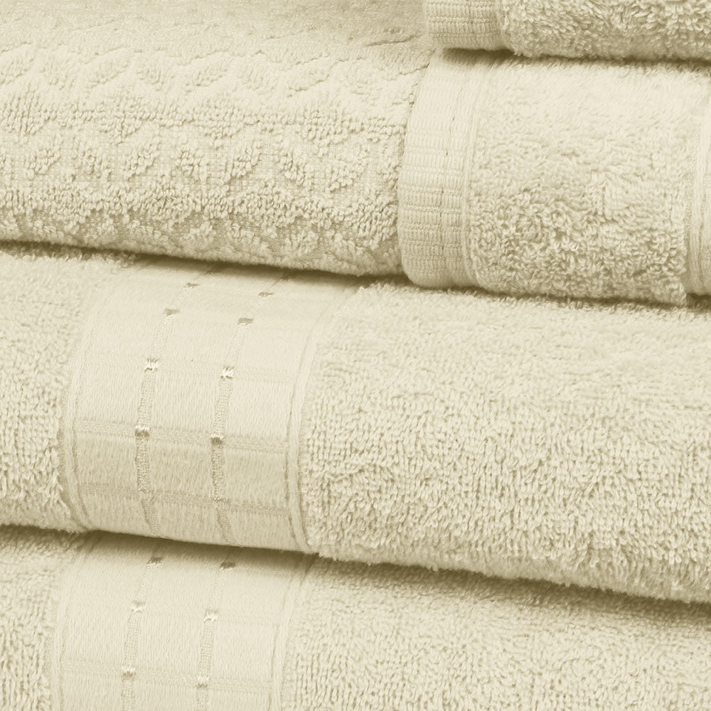 5-piece white cotton towel set featuring bath towels, hand towels, and one plush bath mat — view 4