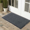 Solid gray outdoor mat with thin low profile design and non-slip rubber backing