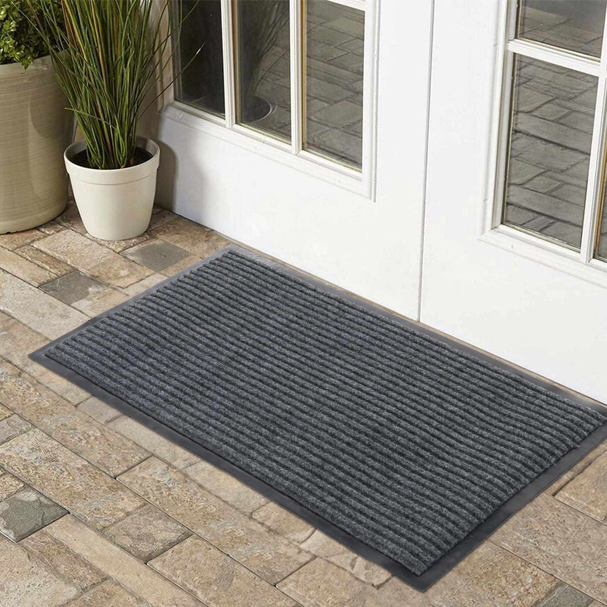 Solid gray outdoor mat with thin low profile design and non-slip rubber backing
