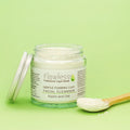 Kaolin clay facial cleanser in an eco-friendly recycled glass jar with an aluminum lid