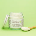 Kaolin and oat clay facial cleanser powder in a recycled glass jar with aluminium lid