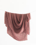 Stone washed linen throw blanket with frayed edges made from premium Belgian flax