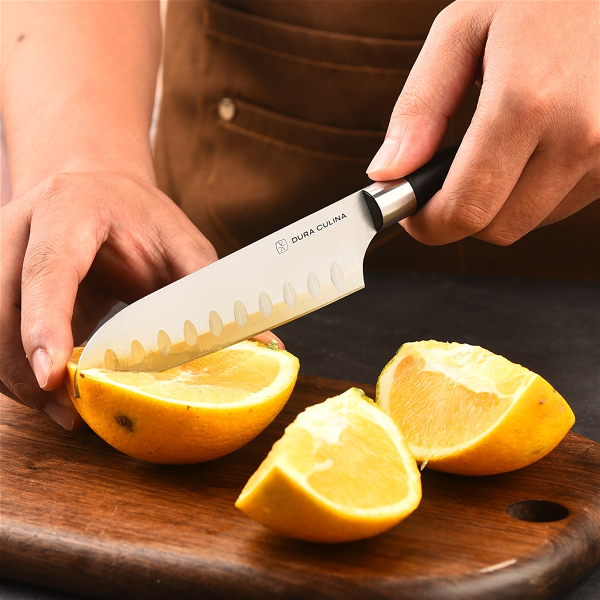 Black 5-piece kitchen knife set with matching protective blade guards forged from high-carbon steel — view 4