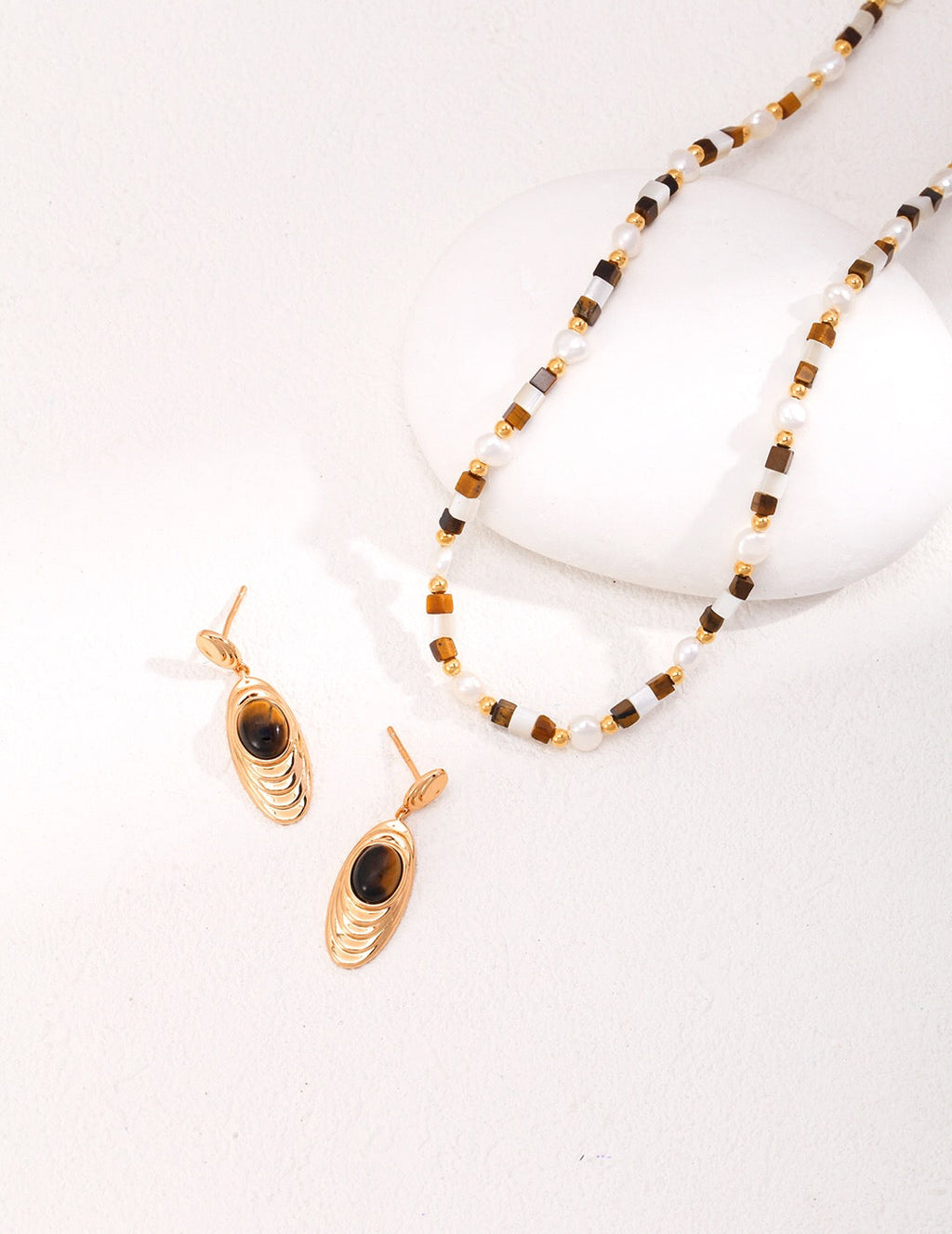 Antique style drop earrings featuring natural tiger eye stones set in 18ct gold vermeil — view 4