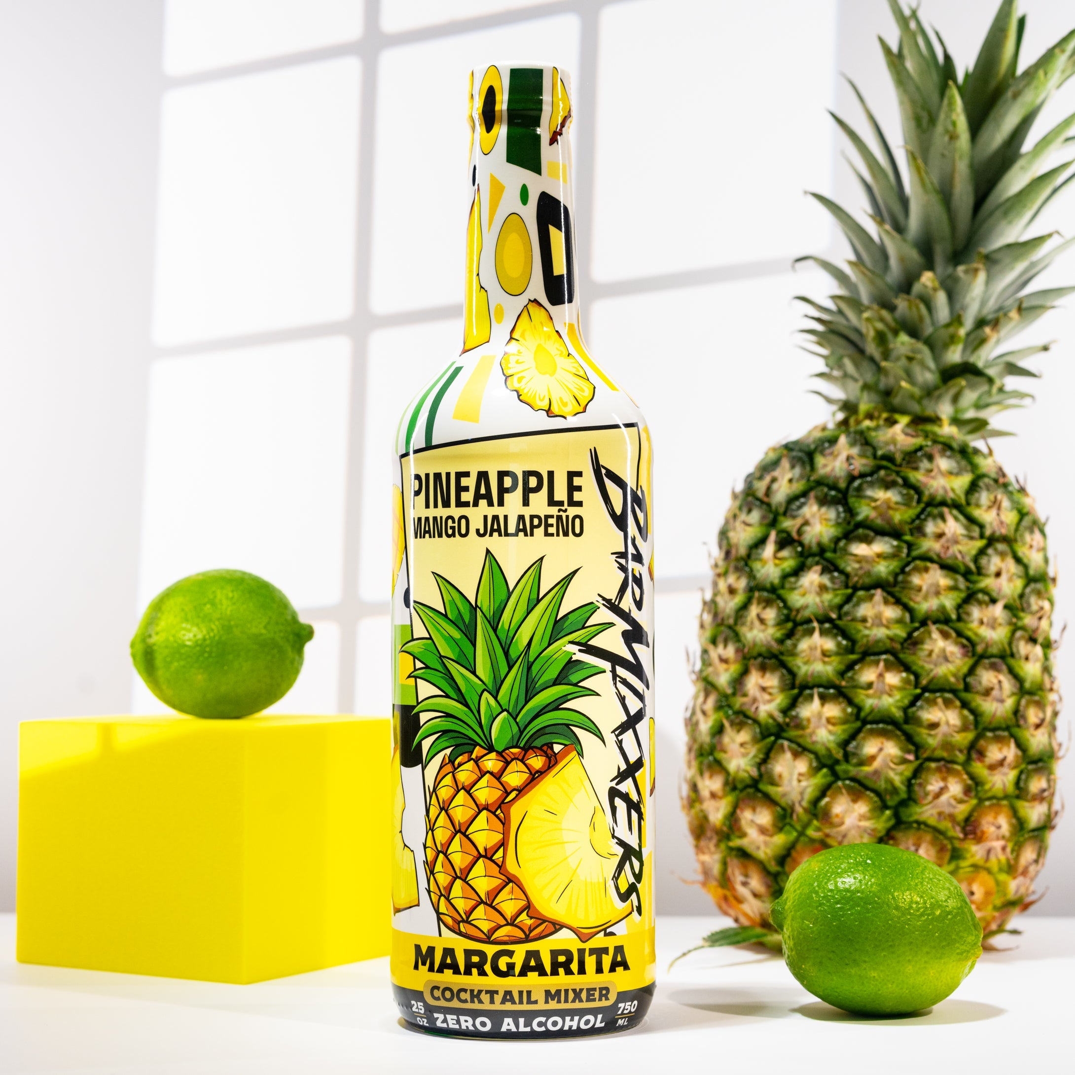 Bottle of pineapple mango spicy jalapeno margarita mix craft cocktail mixer