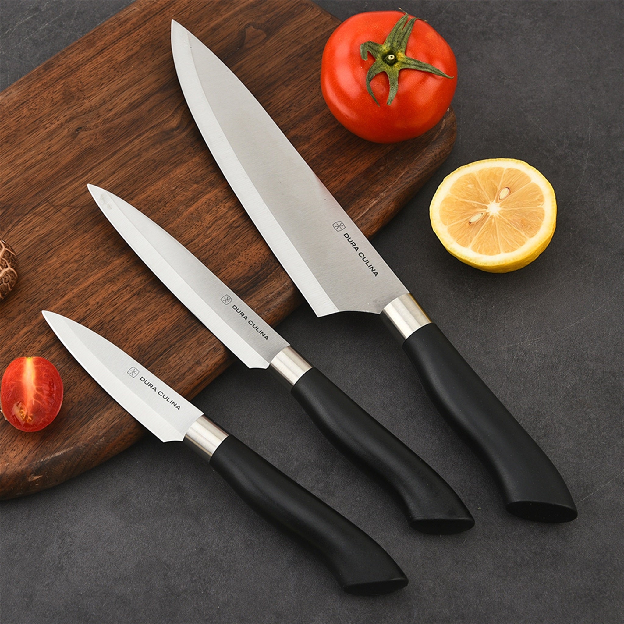 Black 3-piece kitchen knife set with matching blade guards and ergonomic handles for home chefs — view 2
