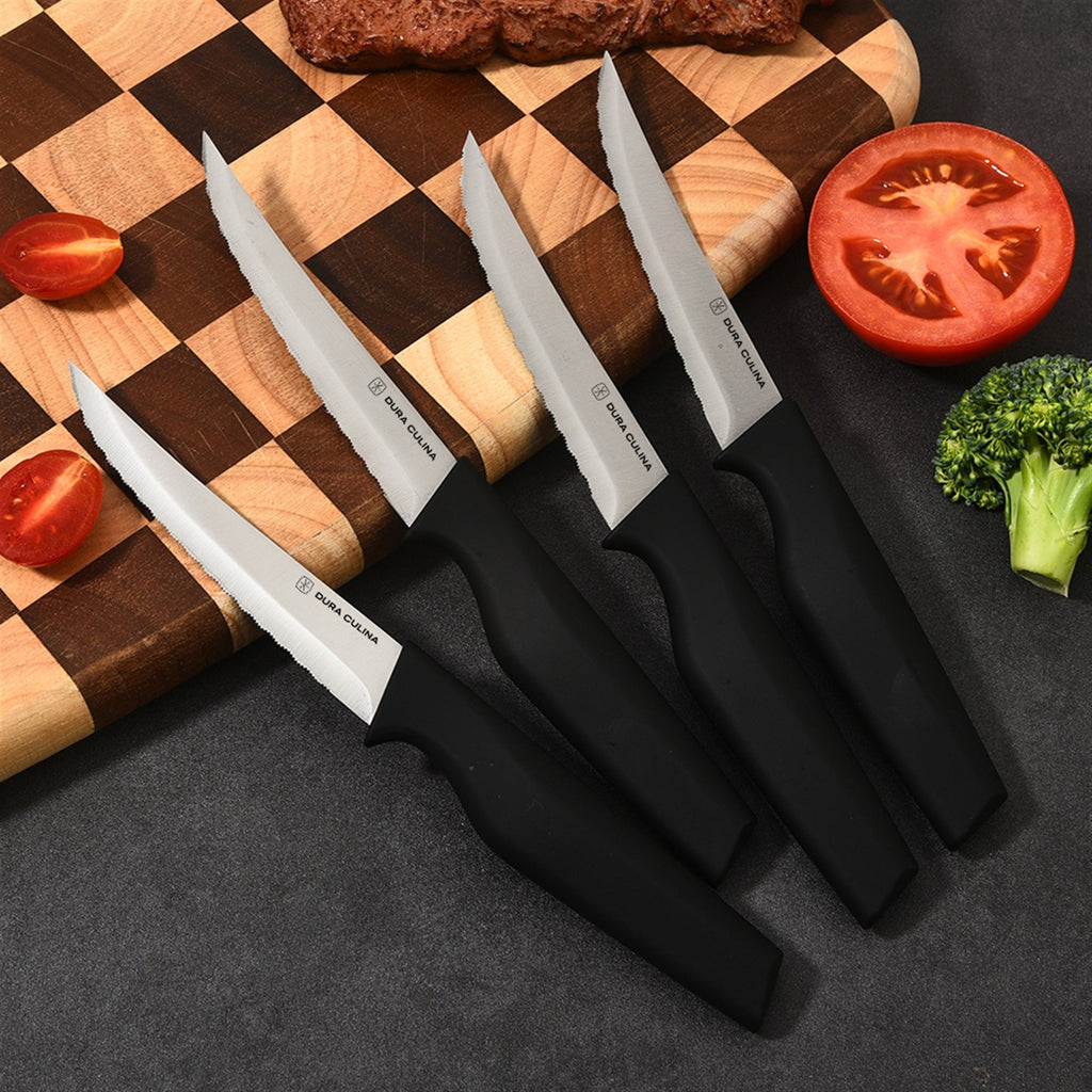 4-piece steak knife set featuring serrated high carbon stainless steel blades and ergonomic soft-grip handles. — view 2