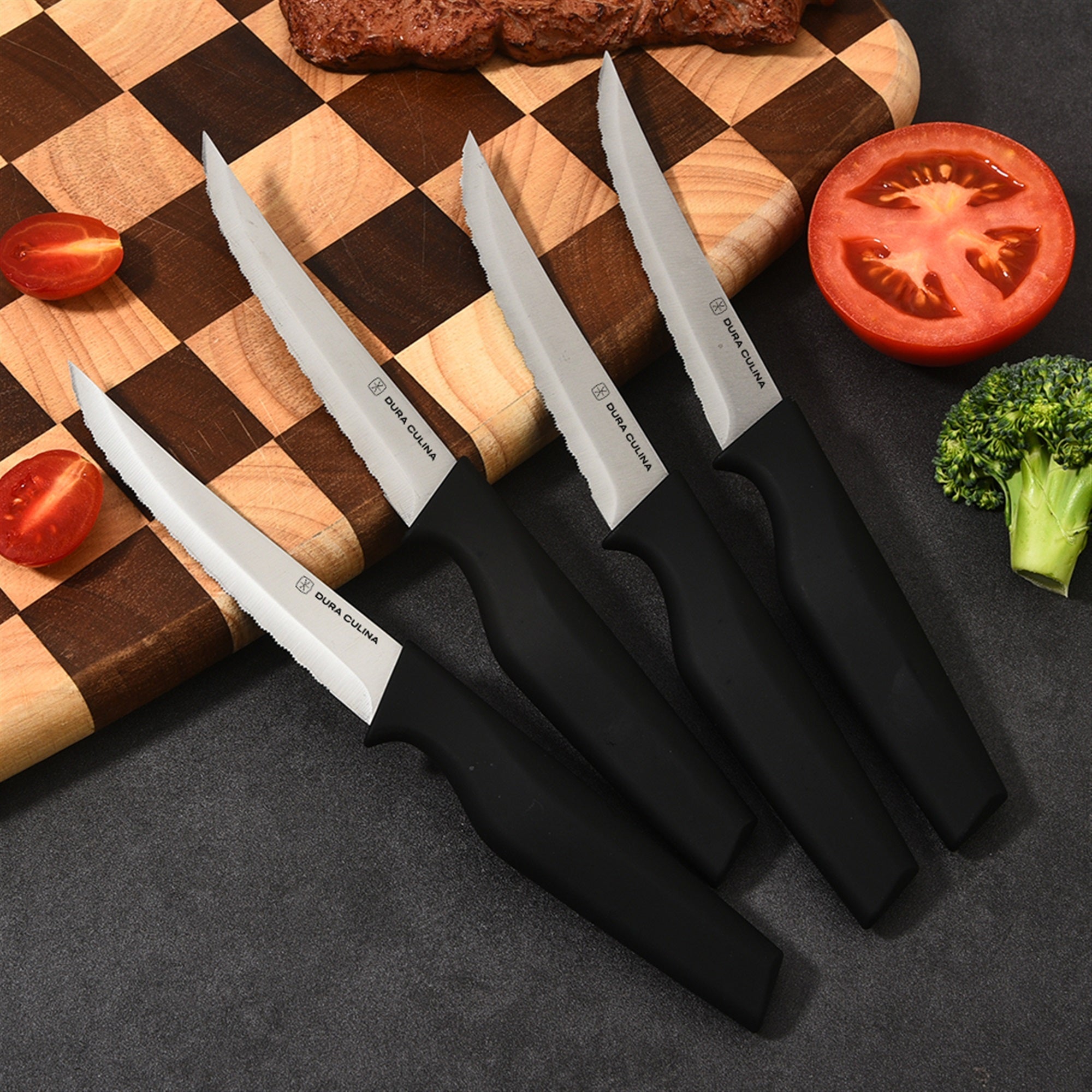 4-piece steak knife set featuring serrated high carbon stainless steel blades and ergonomic soft-grip handles. — view 2