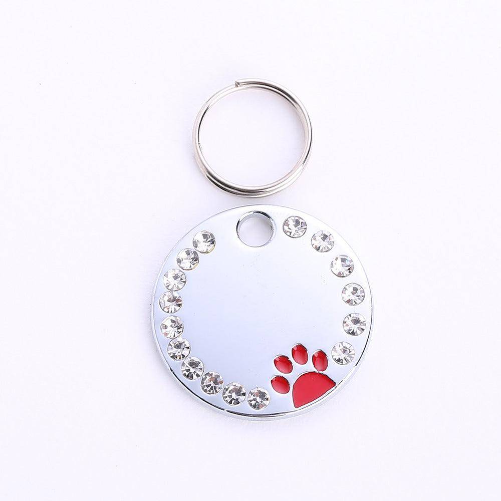 Personalized round metal dog tag keychain with custom engraving for pet owners and animal lovers — view 3