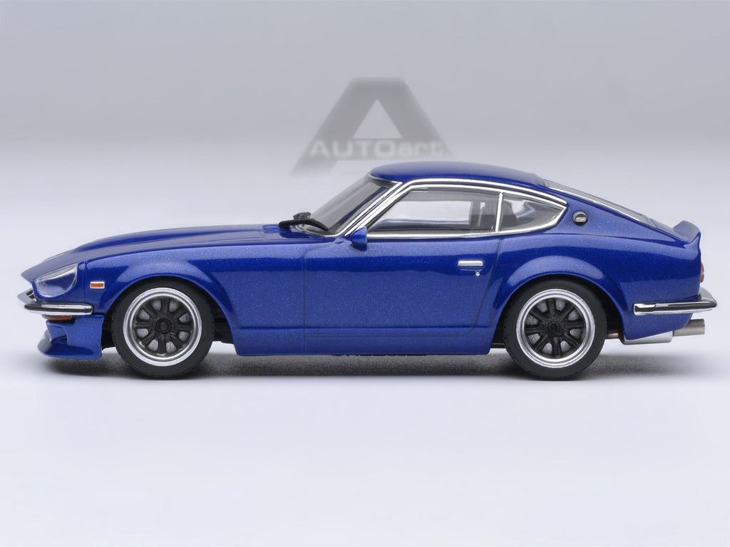 Nissan Fairlady Z 1/64 scale model car in metallic blue inside clear plastic display showcase