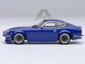 Nissan Fairlady Z 1/64 scale model car in metallic blue inside clear plastic display showcase