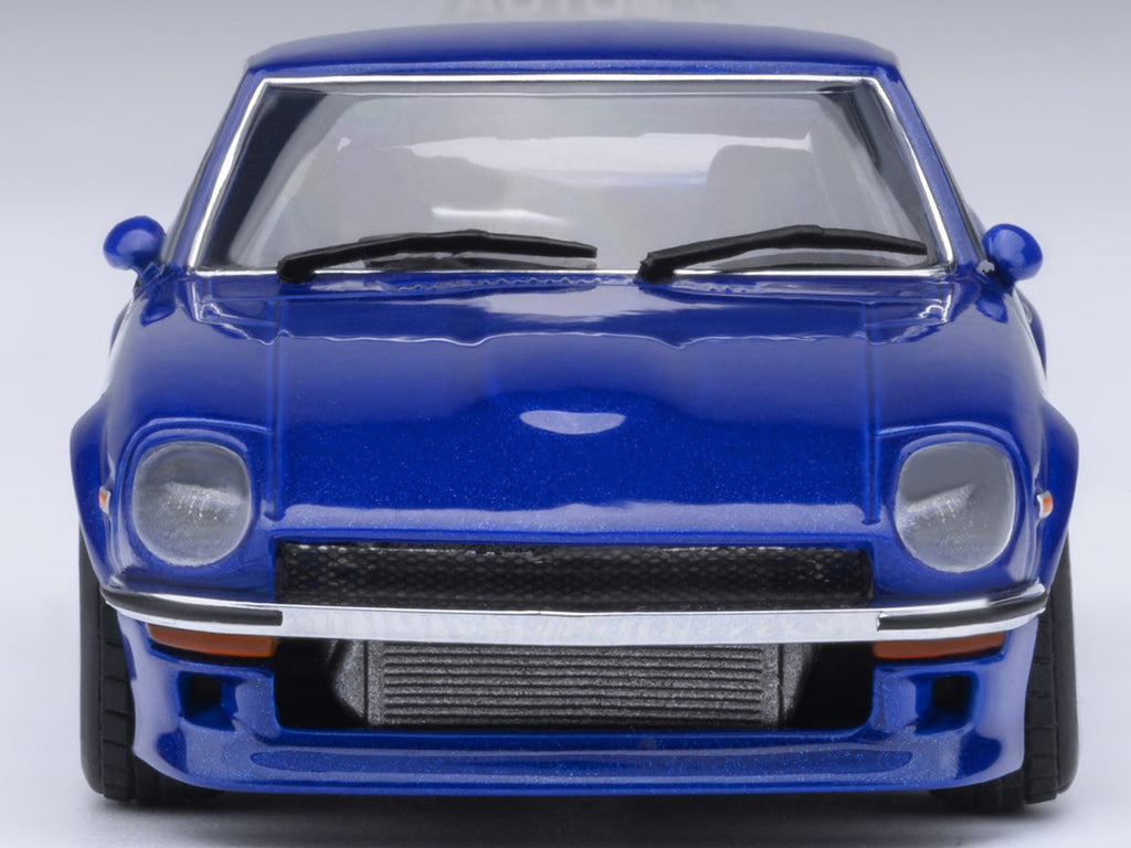 Nissan Fairlady Z 1/64 scale model car in metallic blue inside clear plastic display showcase — view 2