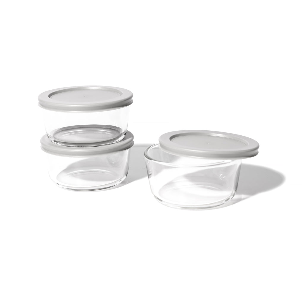 16oz round glass food storage containers with grey airtight lids arranged for kitchen meal prep